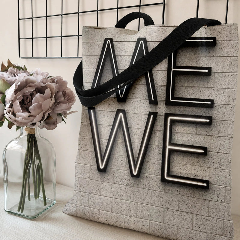 Me We Neon Sign Tote Bag | Bold Typography on Brick Wall Art | Premium Composite Twill Fabric | Trendy Motivational Gift for Her