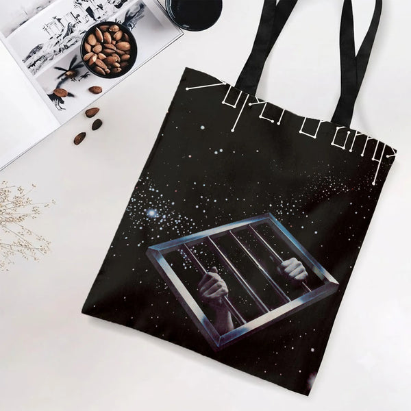 Space Prison Tote Bag | Surreal Hands Behind Bars in Cosmic Galaxy Art | Premium Twill Diamond-Grid Fabric | Unique Gift for 