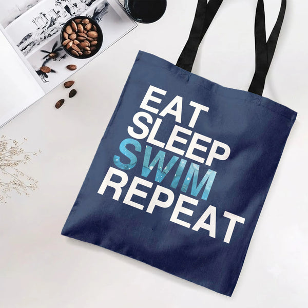 Eat Sleep Swim Repeat Tote Bag | Bold Water-Textured Swimming Typography Art | Premium Twill Diamond-Grid Fabric | Gift for S